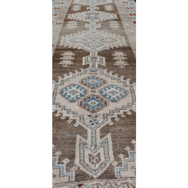 Textile Long Persian Heriz Runner With Central Medallions in Brown, Blue, Tan & Red For Sale - Image 7 of 12