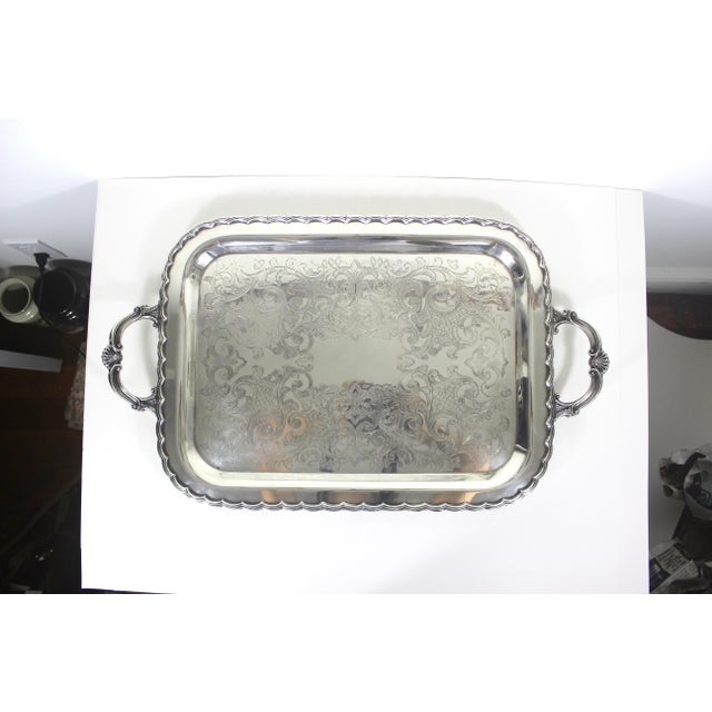 Extra large vintage rectangular silver plated tray with gorgeous scalloped detail around the edge and ornate shell or fan...