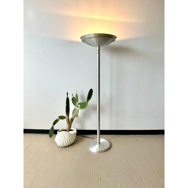 Amazing vintage postmodern brushed aluminum torchiere floor lamp. Brass accents and space age style torchiere. Bold, yet...