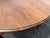 Early 1900s Large Round Oak Farmhouse Dining Table For Sale - Image 11 of 12