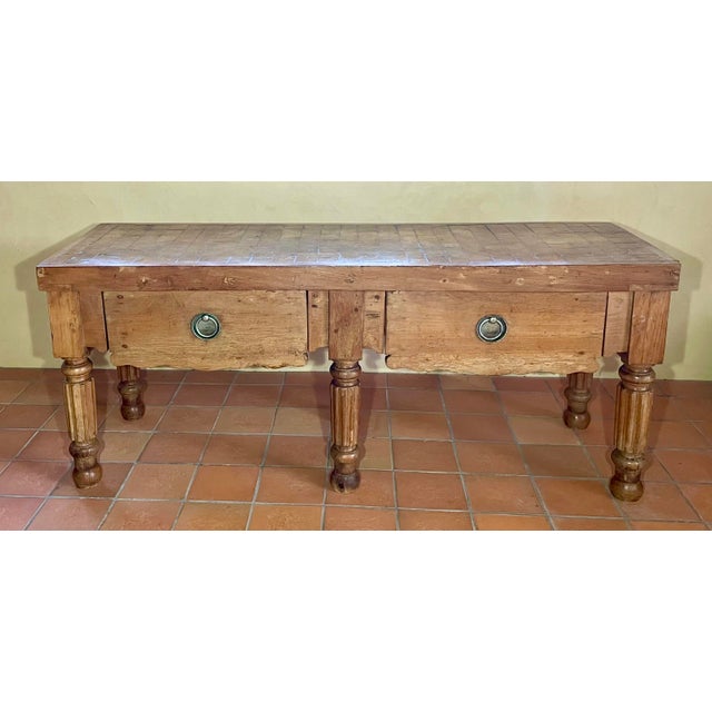 Superb and large butcher's block from the 1950s. It is particularly beautiful with its mosaic of wooden cubes on the work...