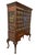An extraordinary large-scale Chinoiserie apothecary cabinet by Maitland-Smith, distinguished by its elaborate painted...