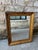 Italian gilt mirror, dating back to the 19th Century. The mirror itself has been replaced over time, but the gilt frame is...