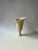 Lys Sculptural Vase in Glazed Stoneware by Thalia Dalecky. Dimensions: Ø 25 x H 33 cm. Materials: Cream chamotte...