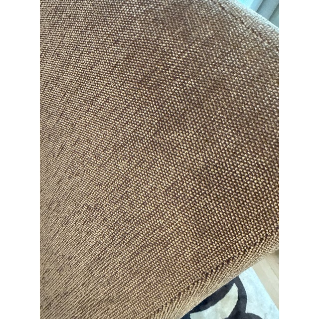 Elegant and sculptural, this rare John Hutton for HOLLY HUNT sofa embodies understated luxury with its sweeping shelter-...