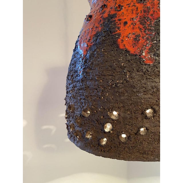 Brutalist ceramic lamp from Denmark. A simple ceramic lamp that stands out primarily for its atmospheric light. The lower...