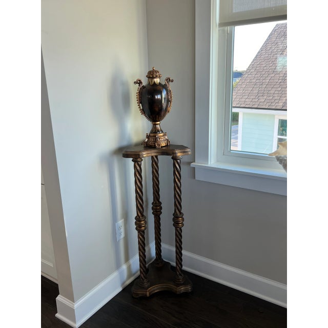 Lovely twisted leg details make this a stunning piece.