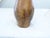 This hand thrown glazed terra cotta vase has gradiations of colors. It is 16"H x 8"Diameter