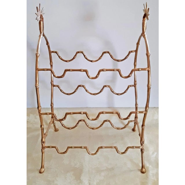1950's Maison Baguès France gilt bronze faux bamboo wine rack. The rack holds 9 bottles. Beautiful, rich golden finish...