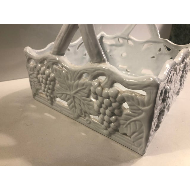 This fabulous Majolica Blanc De Chine Ceramic Bowl / Basket will be a nice accent on your kitchen counter or tabletop....