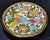 1980s Cearco hand-painted Spanish ceramic embossed Coaster, featuring a colorful bird surrounded by flowers and accented...