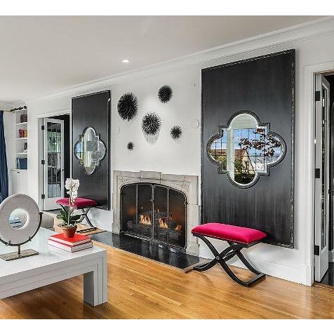 Beautiful pair of tall decorative wall mirrors from a high-end interior design collection. Each panel features a...