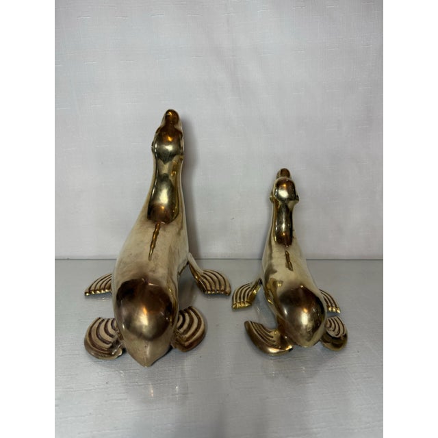 Dolbi Cashier Chic Vintage Mid-Century Brass Sea Lions Pair - Elegant Metal Art for Home Decor For Sale - Image 4 of 10