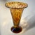Large Murano-style hand blown "tortoise shell" glass-footed vase in amber and brown shades. Vase is large and heavy,...