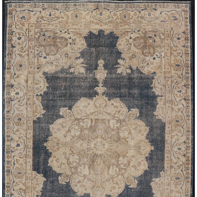 Tan Distressed Turkish Carpet With Floral Design in Blue, Tan, Taupe, and Cream 5'2 X 8'5 For Sale - Image 8 of 10