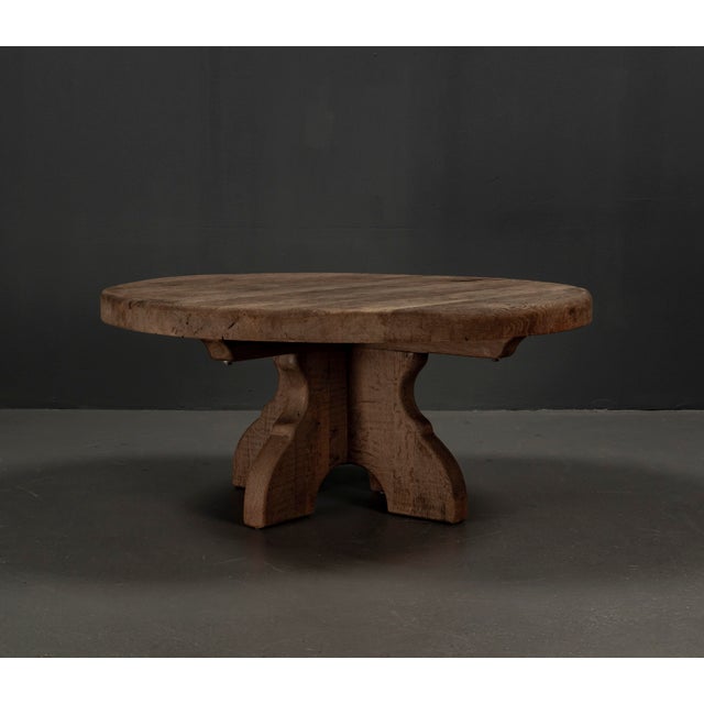 Large and heavy rustic rural round coffee table on a four legged oak base. The solid, rounded oak tabletop offers plenty...