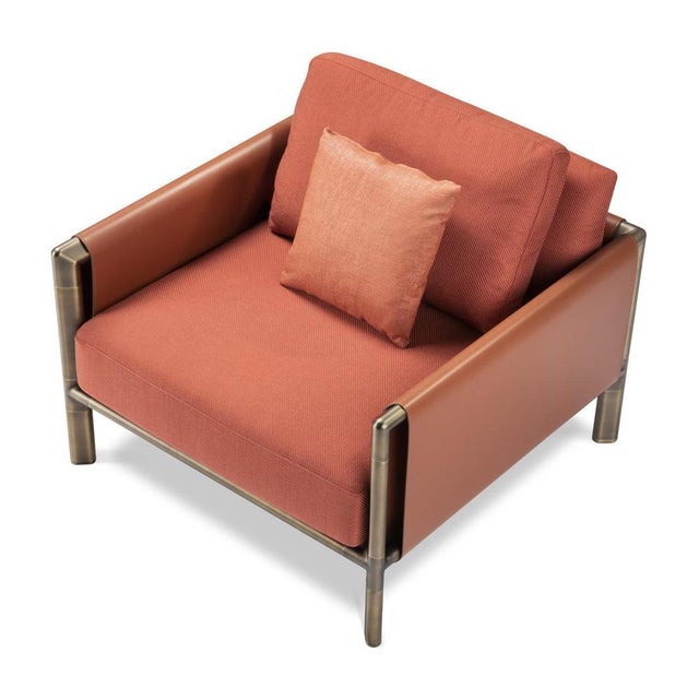 The warm and stylish design of the Frame Armchair invites you to take a moment of relaxation. with the frame crafted in...