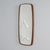 Danish wall mirror in teak from the 60s with a slim, organically shaped edge and rounded corners. The soft lines, warm...