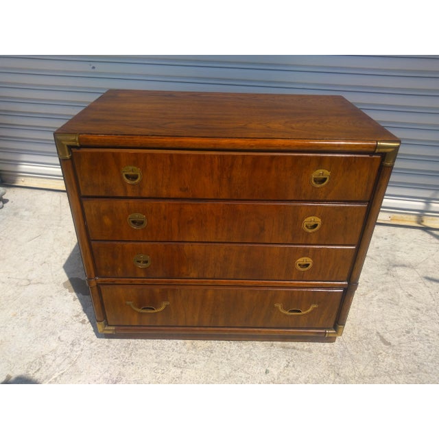 This is a nice looking chest by Drexel. It has 3 drawers and the middle drawer is a double drawer. It's made of walnut and...