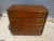 This is a nice looking chest by Drexel. It has 3 drawers and the middle drawer is a double drawer. It's made of walnut and...
