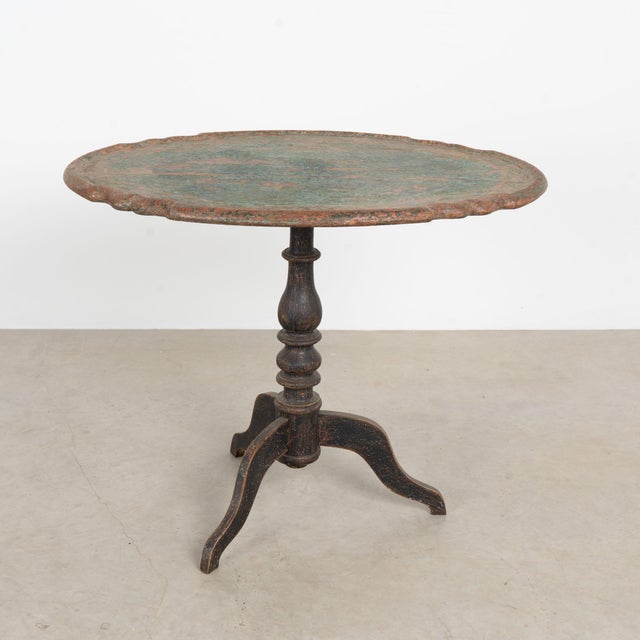 Late 18th century Swedish pedestal table, crafted in pine with a highly distressed original painted finish. Years of wear...