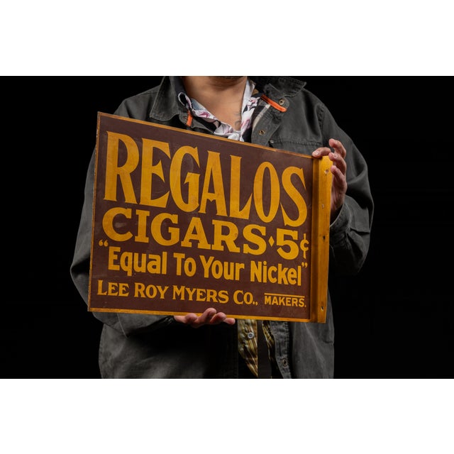 c. 1910s/1920s; Lee Roy Myers Co. - Savannah, GA Antique tin litho cigar flange advertising sign. This piece advertises...