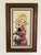 Vintage original oil painting signed Koros, depicting a wide-eyed child holding a doll in the distinctive mid-century “big...