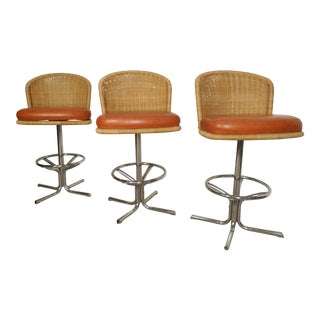 Three Mid-Century Chrome and Wicker Barstools by Daystom For Sale