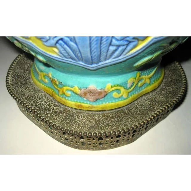 In the Chinese culture cranes are the symbols of longevity. This ceramic vase was converted into a table lamp and features...