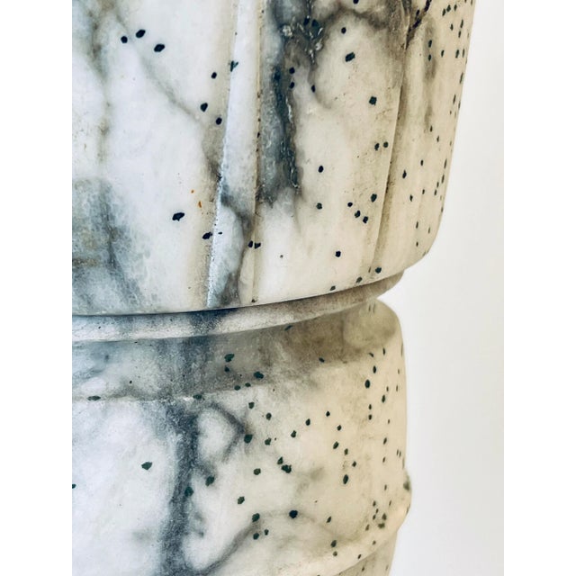 Alabaster table lamp. 18” tall 51/2” wide. Circa 1980s.