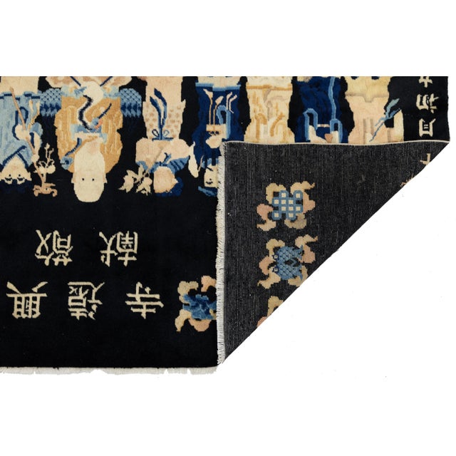 A stunning and rare hand-knotted wool rug inspired by Chinese folklore, featuring Taoist immortals. The rug showcases a...