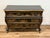 An elegant and highly decorative Nancy Corzine Chinoiserie Bombay Commode, featuring a classic serpentine bombe silhouette...