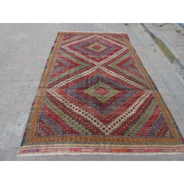 Vintage handwoven kilim rug from Denizli region of Turkey. Approximately 50-60 years old. It has been washed properly and...