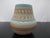 Navajo Native American pottery vase by artisan Susie Charlie. Sgrafitto vase with polychrome etched design in earth tones...
