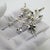 A vintage decorative miniature depicting holly and mistletoe, crafted in arezzo between the 1980s and 1990s in authentic...