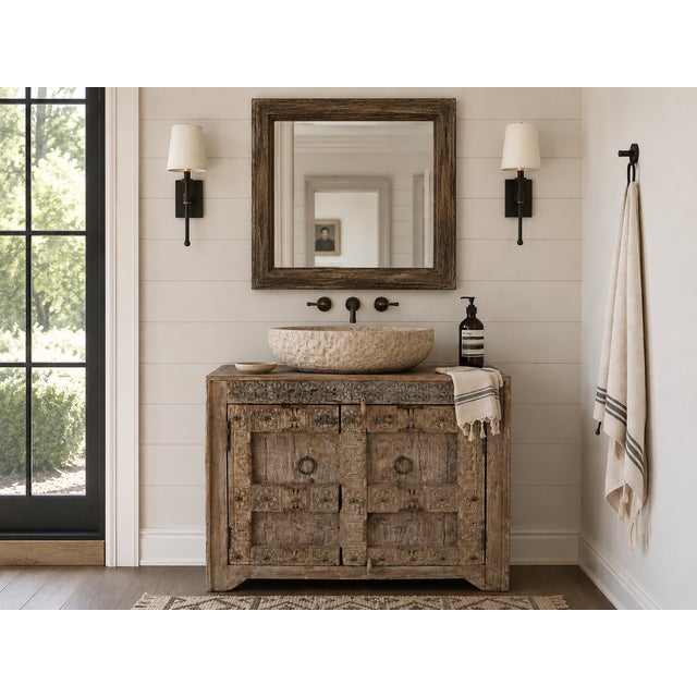 Handcrafted from antique Indian carved door panels and reclaimed wood, this distinctive Cabinet/Buffet features richly...