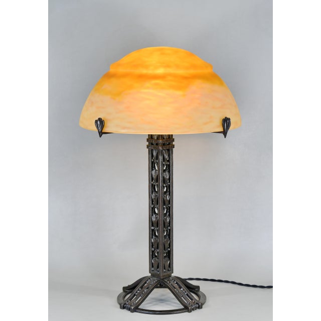 Raymond Subes & Daum A large and very rare French art deco lamp made around 1925 by Raymond Subes in wrought iron of...