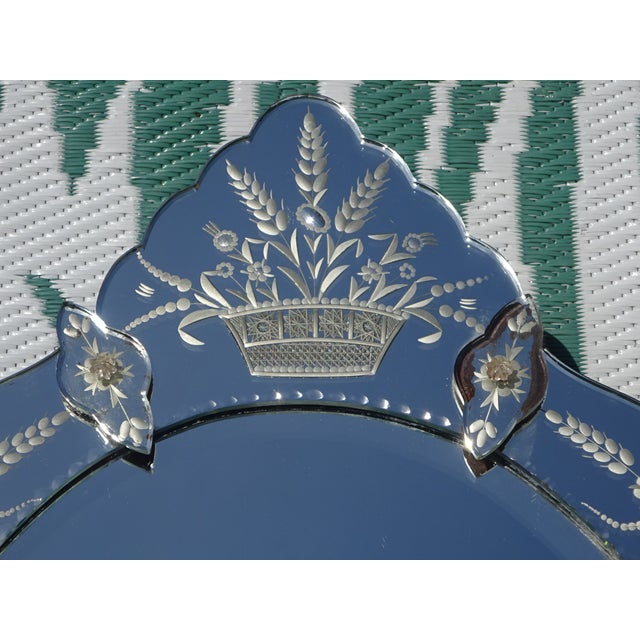 Magnificent vintage mirror from the mid-20th century, in the Venetian style. This exceptional piece is distinguished by...