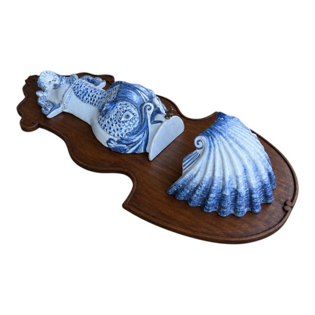 This is an Italian blue and white terracotta grotto inspired dolphin and shell form lavabo or wall fountain or even a...