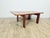 An exceptional Danish coffee table crafted from solid teak, dating back to the 1970s. The piece is characterized by a...