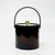 Oxblood faux-leather ice bucket. This is a beautiful 1970s oxblood brown faux leather ice bucket; featuring a cylindrical...