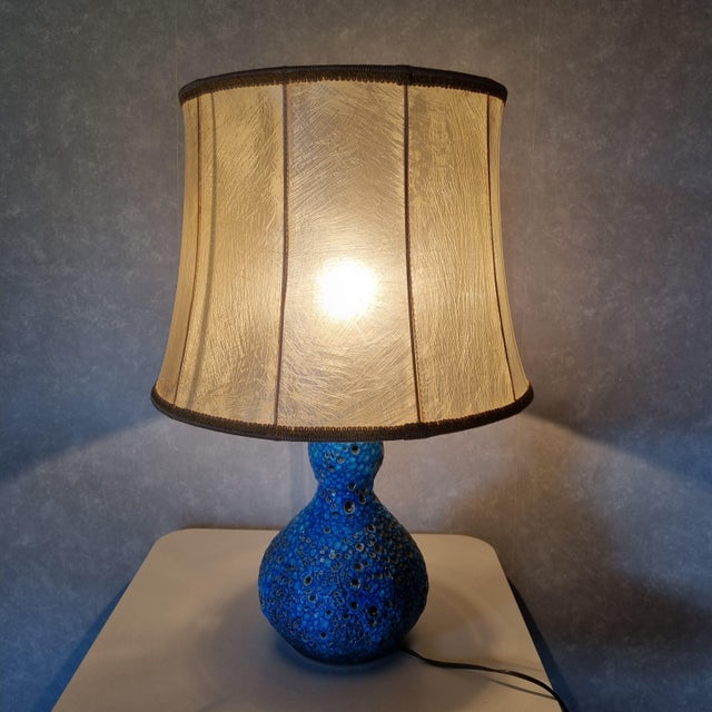 Table lamp: In 1948, ceramicist Charles Cart founded Poterie du Cyclope, specializing in enamel work. In 1961, he...