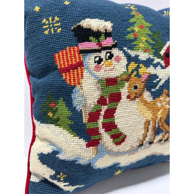 Vintage 1991 Peking Handicraft Christmas pillow featuring a hand-worked wool needlepoint scene of a snowman and reindeer...
