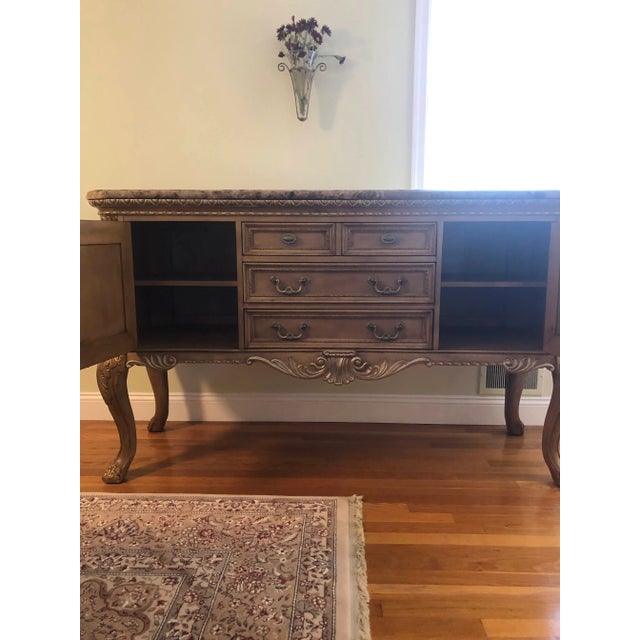 This beautiful, elegant American Drew mirage Leg sideboard with an antique Emperador marble top with rounded edges gives...