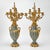 This exceptional pair of 19th-century French candelabra exemplifies the elegance and refinement of the Louis XVI...