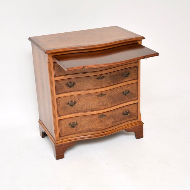 A fantastic antique Georgian style burr walnut chest of drawers. This was made in England, it dates from around the...