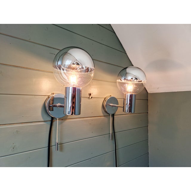 Pair of space age wall sconces, designed by japanese designer motoko ishii for the german manufacturer staff leuchten,...