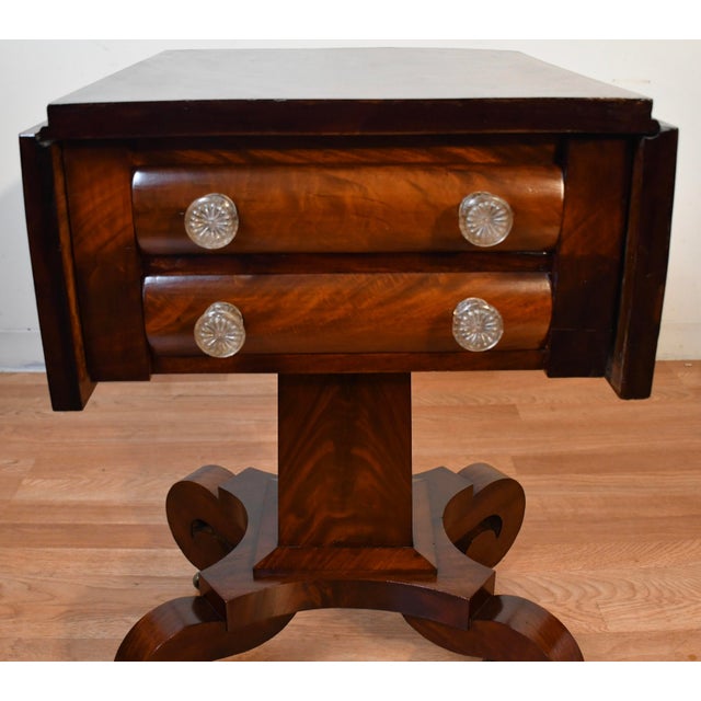 We are pleased to offer this beautiful Antique American Empire Drop-leaf Pembroke / Work table , From the 1880s . This...