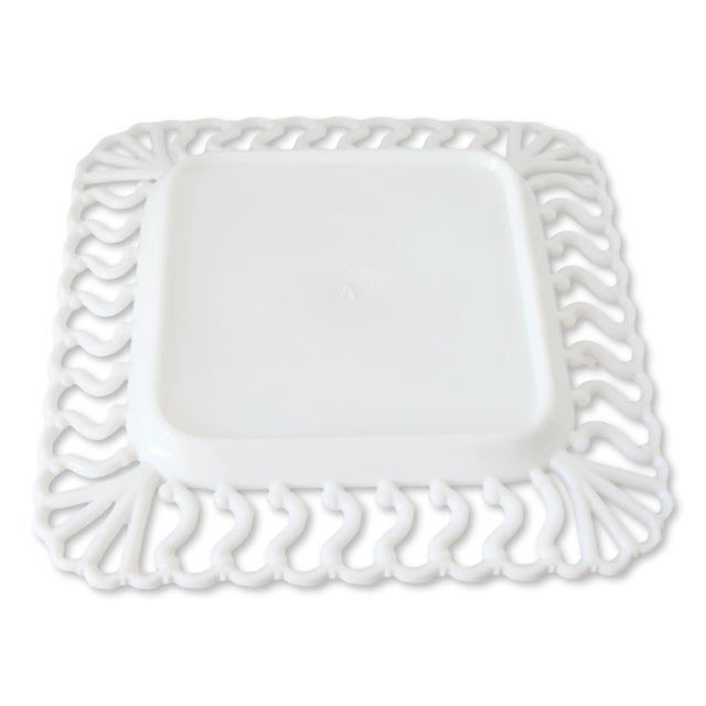 Enhance your table setting with a touch of vintage elegance using these two Westmorland milk glass serving plates. One...