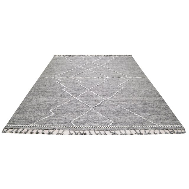 Moroccan Beni Ourain hand knotted rug with natural colors, contemporary style and soft texture.